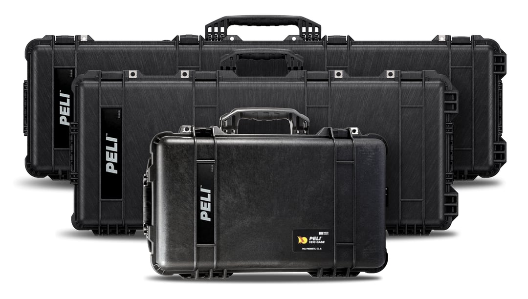 Trois valises Protector noires de tailles différentes, dont deux valises longues